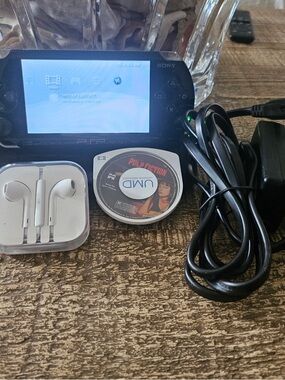 Sony Black PSP Portable Media Player with UMD Movie and Accessories